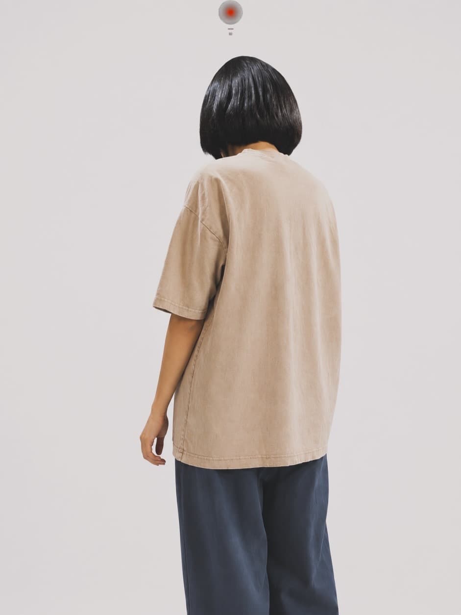Beige Acid Washed Oversized T-Shirt — model wearing tee, back view